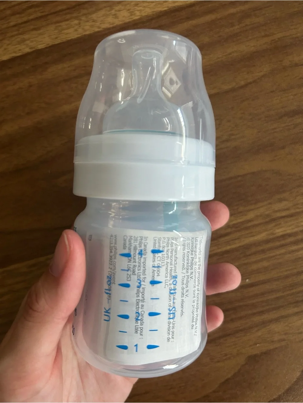 Philips Avent Clear Baby Bottle with White Cap and Teal Accent